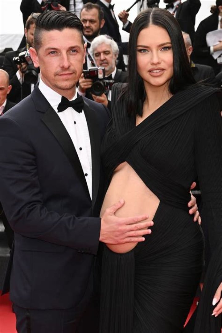 Adriana Lima, 40, Shows Off Bare Baby Bump In Sexy Cutout Dress On Runway: Photos