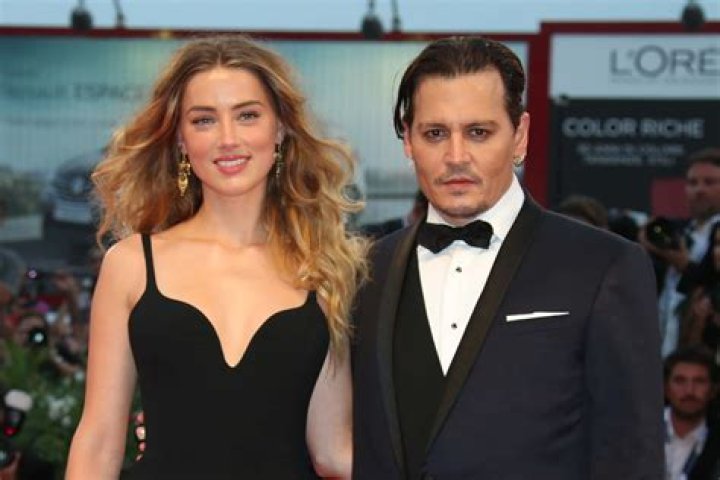 Amber Heard: Johnny Depp’s Fiancee Glows At Premiere