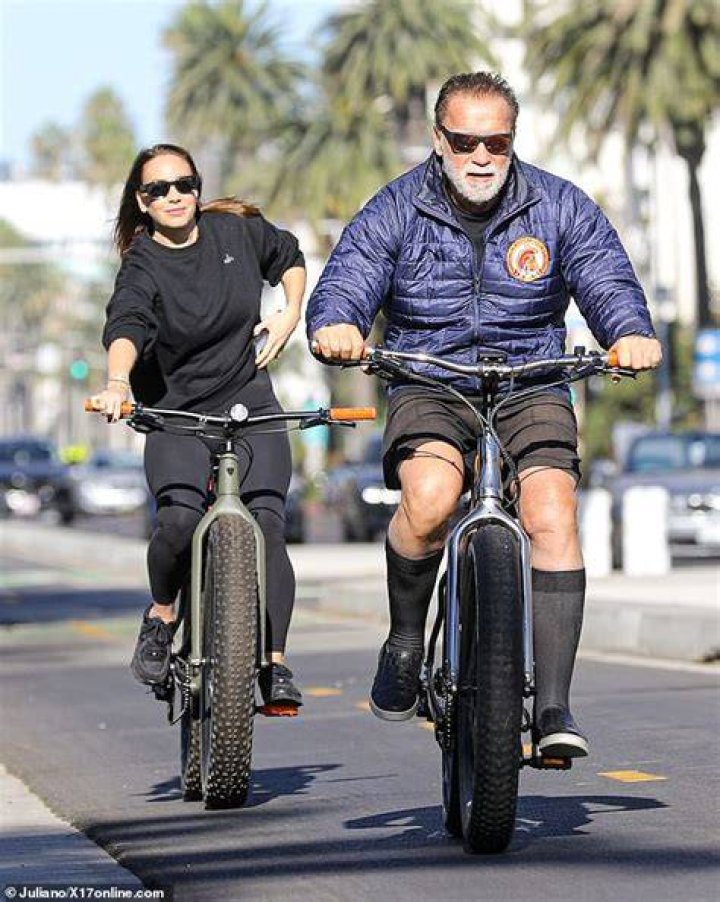 Arnold Schwarzenegger Kisses Actress Timea Palacsik on Bike Ride – Hollywood Life