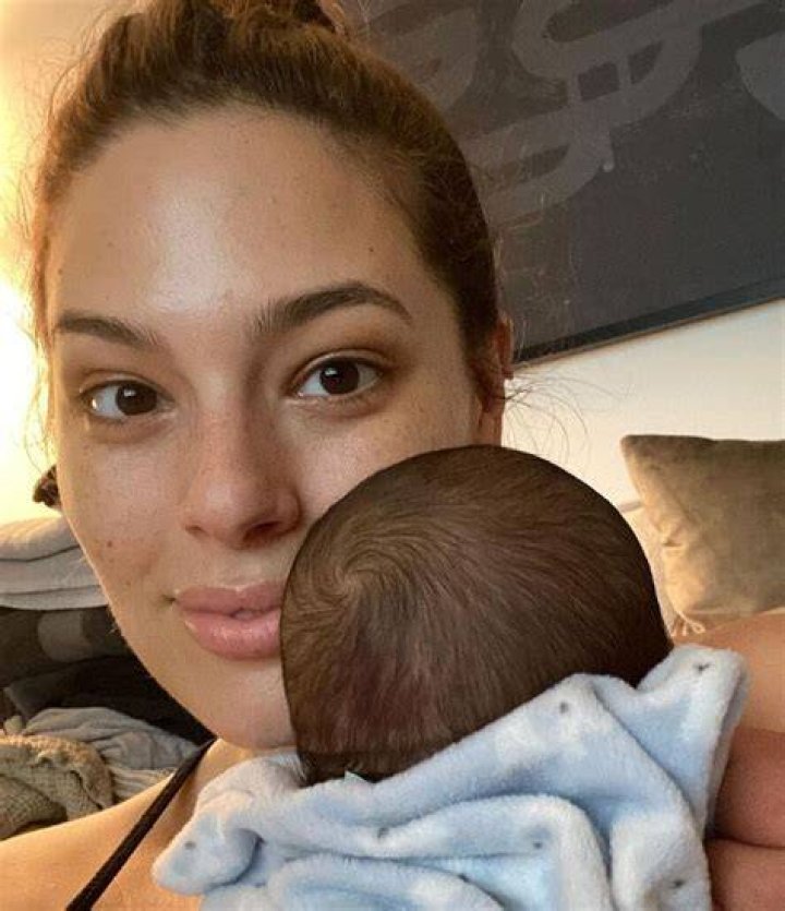 Ashley Graham’s Husband Cradles Her Bare Baby Bump In Stunning ‘Vogue’ Photo Shoot — Pic