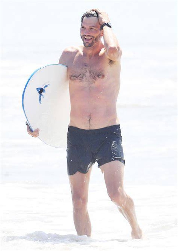 Ashton Kutcher Plays Football On The Beach Shirtless With Mila Kunis After Health Scare