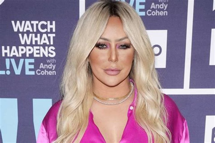 Aubrey O’Day Poses In Blue Swimsuit In New Video: Watch – Hollywood Life