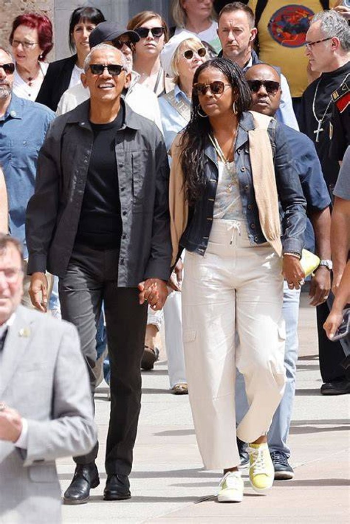 Barack & Michelle Obama Hold Hands Out With Steven Spielberg In Spain: Photos
