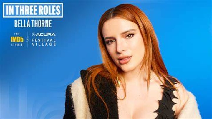 Bella Thorne Wears Red Latex Thong, Bra & Thigh-High Boots In Video – Hollywood Life