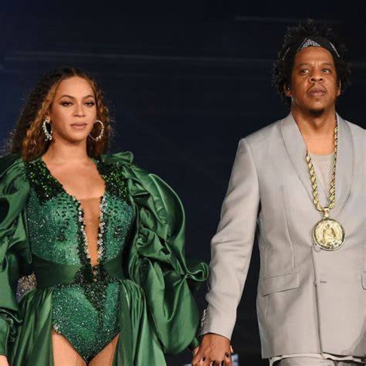 Beyonce Looks Stunning In Plunging Silk Dress In New Pics From European Vacation With JAY-Z