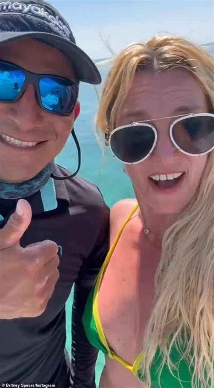Britney Spears Dives Off A Boat & More In Purple Bikini As She Reminisces About Sailing On Vacation
