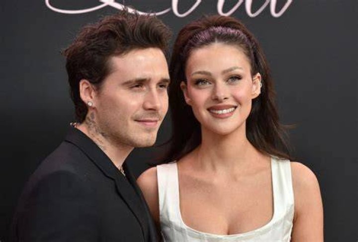 Brooklyn Beckham Kisses Nicola Peltz’s Neck On The Red Carpet At Dior Men’s Show: Photos
