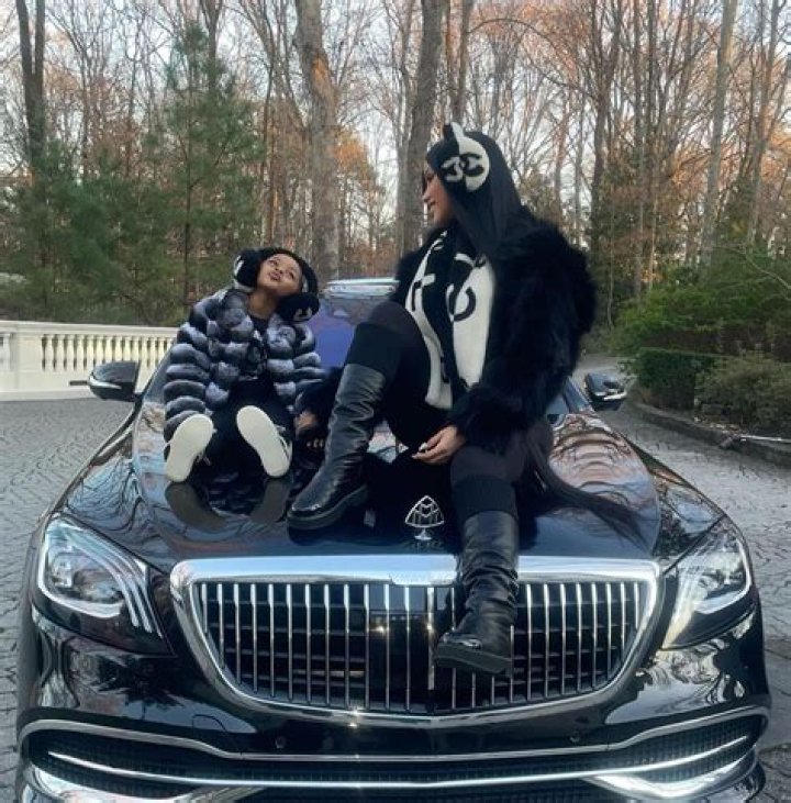 Cardi B & Daughter Kulture, 3, Rock Matching Chanel Ear Muffs While Posing On A Maybach — Photos
