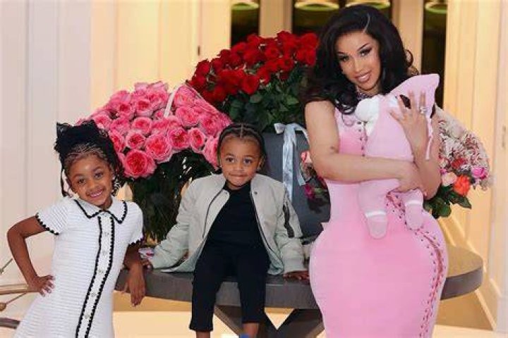 Cardi B’s Daughter Kulture, 2, Models Corn Rows & A $2,140 Louis Vuitton Backpack — See Pics