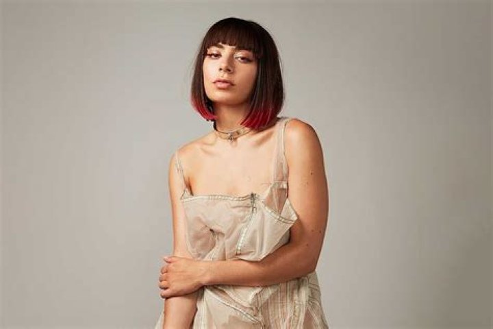 Charli XCX & HAIM Dare You To ‘Fall In Love’ On Their New Song, ‘Warm’ — Listen