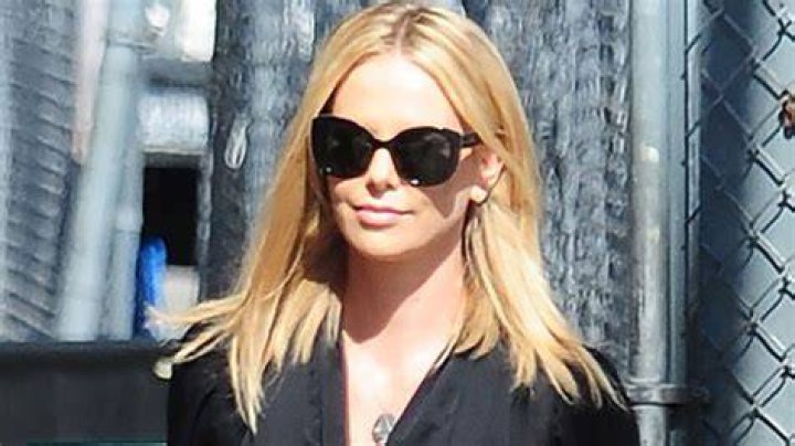 Charlize Theron Dances With Her 2 Daughters At Taylor Swift Concert – Hollywood Life