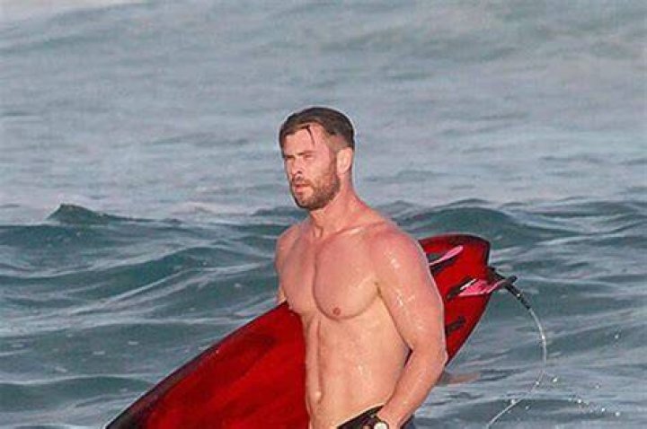 Chris Hemsworth, 39, Goes Shirtless As He Surfs With Twins Tristan & Sasha, 8, In Australia: Photos