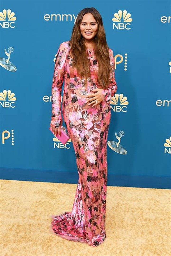 Chrissy Teigein Shows Off Her Baby Bump At The Emmys In Metallic Gown