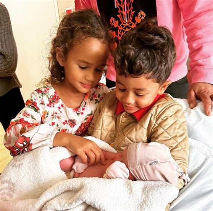 Chrissy Teigen Debuts Newborn Baby Girl & Reveals Her Name In Sweet Photo With Luna & Miles
