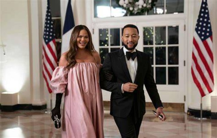 Chrissy Teigen Shows Off Her Baby Bump In A Tight White Tank While Out With John Legend