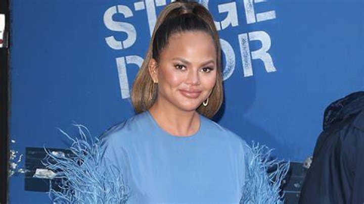 Chrissy Teigen Wears One Piece Swimsuit In Fun ‘Good Morning’ Song Video – Hollywood Life