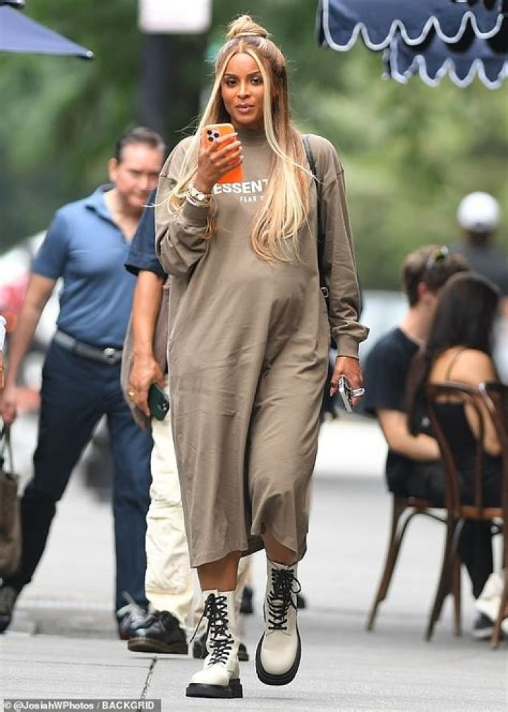 Ciara Covers Up Her Baby Bump & Shows Off Her Legs In Leather Skirt At NYFW