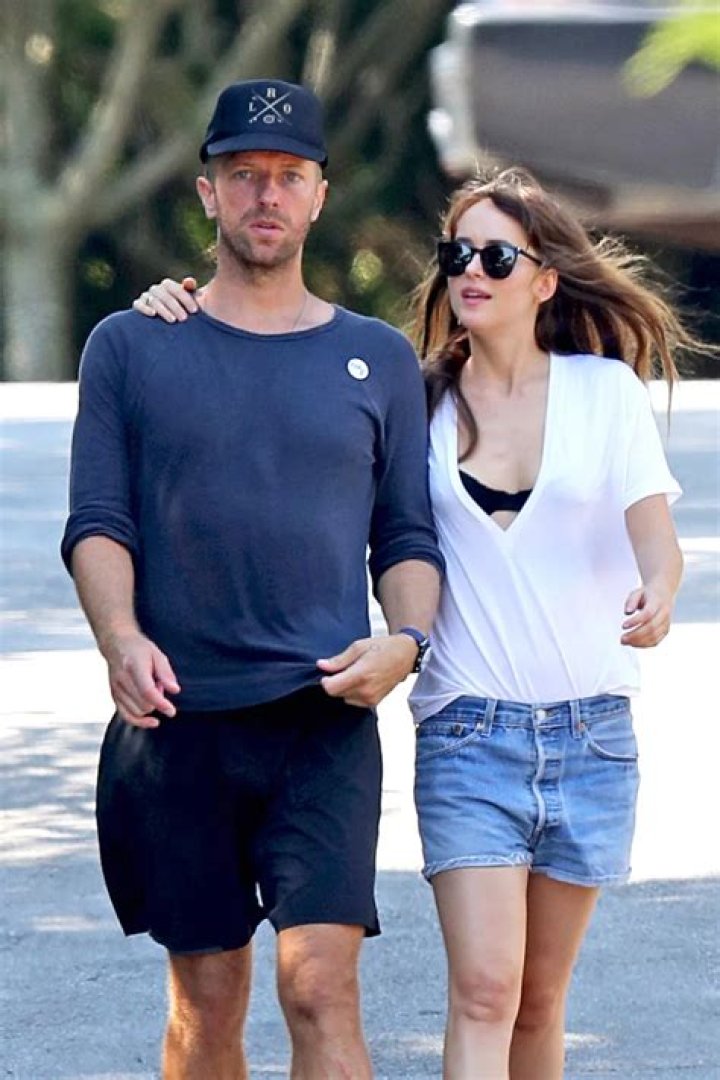 Dakota Johnson & Chris Martin Are Spotted In Rare Outing Driving Around Malibu In Her Mustang — See Pics