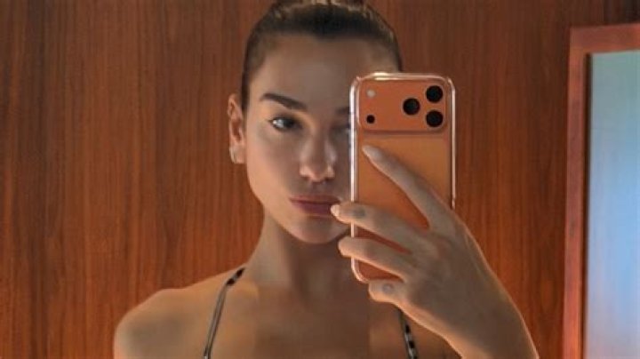 Dua Lipa’s Orange Check Bikini On Miami Beach – Photos – Hollywood Life
