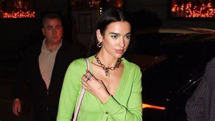 Dua Lipa Wears Green Sweater & Mini Skirt To Milan Dinner: Photo – Hollywood Life