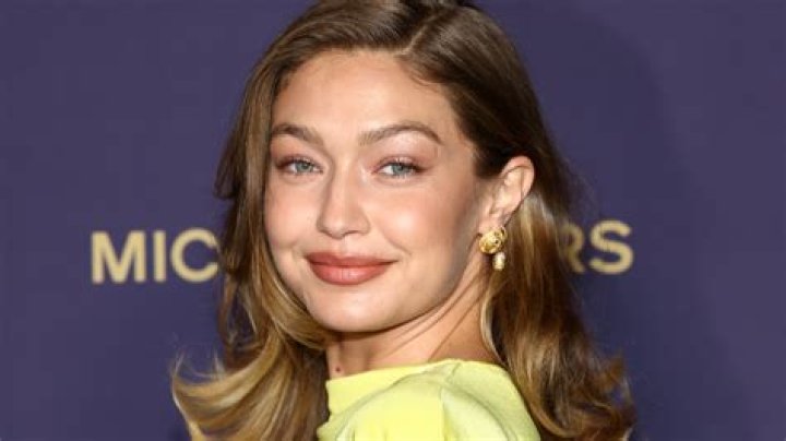 Gigi Hadid Shows Off Toned Figure In Skintight Sparkly Sheer Dress At 2019 CMA Awards