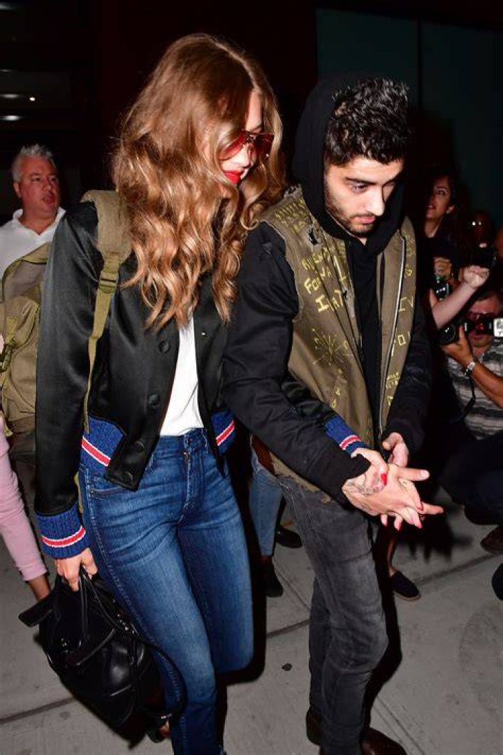 Gigi Hadid & Zayn Malik Hold Hands In Sweet 1st Photo Since She Confirmed Their Baby News