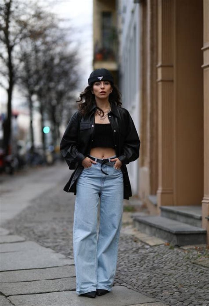 Hailey Baldwin Slays In Plunging Leather Corset Top With Baggy Jeans For Night Out – Photos