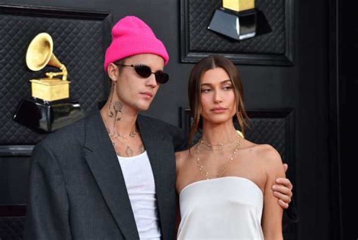 Hailey Bieber Rocks White Swimsuit As She Declares It’s ‘The Weekend’: Photos