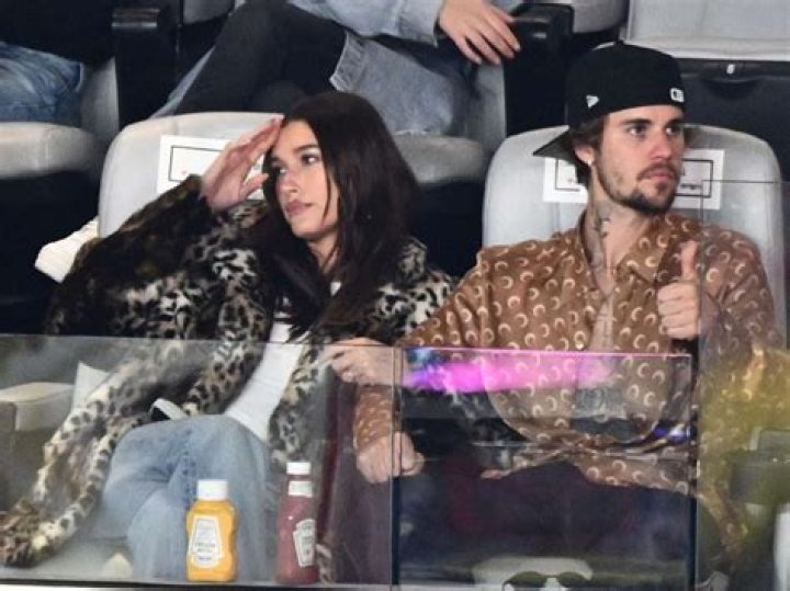 Hailey Bieber Shows Off Her Dark Brown Hair Makeover at the Super Bowl With Justin Bieber