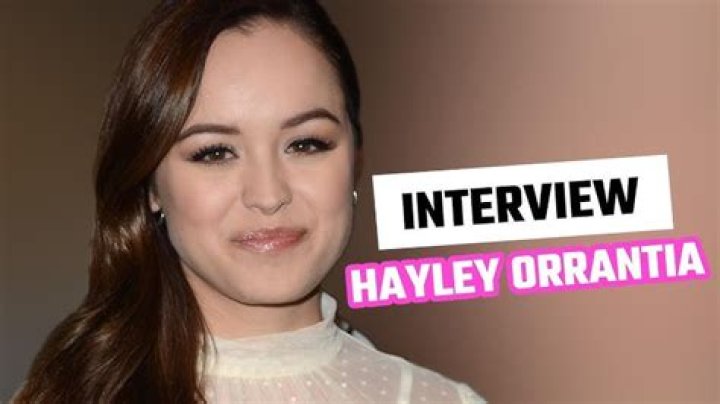 Hayley Orrantia Gives A ‘Nod To Country Roots’ With Pop-Centric Single ‘Open Your Mouth’