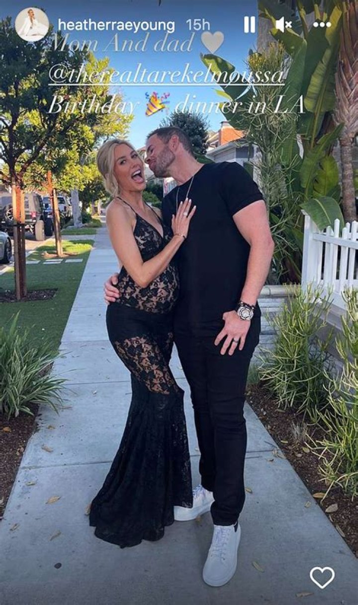 Heather Rae Young Covers Baby Bump In Black Lace Dress As She Kisses Tarek El Moussa