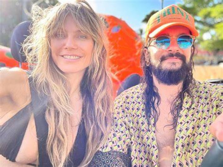 Heidi Klum, 49, Rocks Black String Bikini As She Hovers Over Working Husband Tom Kaulitz