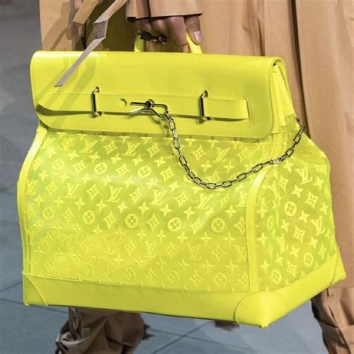 J.Lo Rocks Yellow Crop Top & Neon Louis Vuitton Bag For Business Meeting Before Ben Affleck’s Motorcycle Visit
