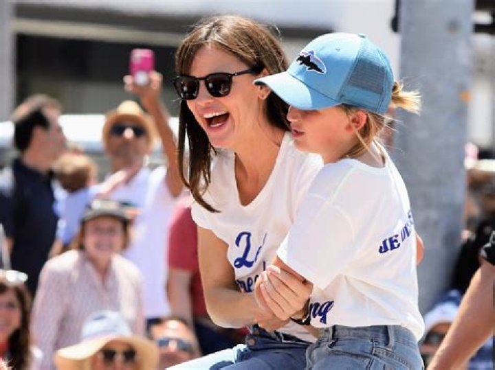Jennifer Garner Holds Hands With Son Samuel, 10, As She Returns To LA After NYC Trip