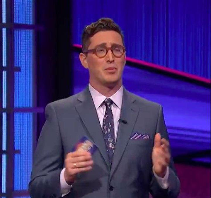‘Jeopardy’ Fan Favorite Buzzy Cohen On Honoring Alex Trebek As A Host & If Fans Should Pick His Successor