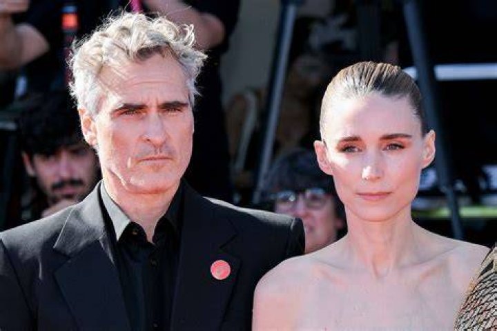 Joaquin Phoenix Wraps An Arm Around Rooney Mara As Couple Makes Rare Outing Together