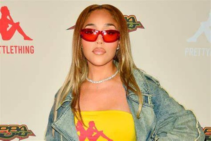 Jordyn Woods Models Affordable $26 Bikini & Sheer Shirt In Sexy New Instagram Pic