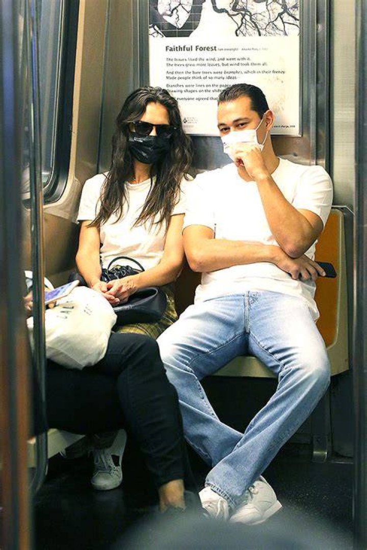 Katie Holmes & Emilio Vitolo Jr. Hold Hands In NYC Before Cuddling On The Subway – See Pics