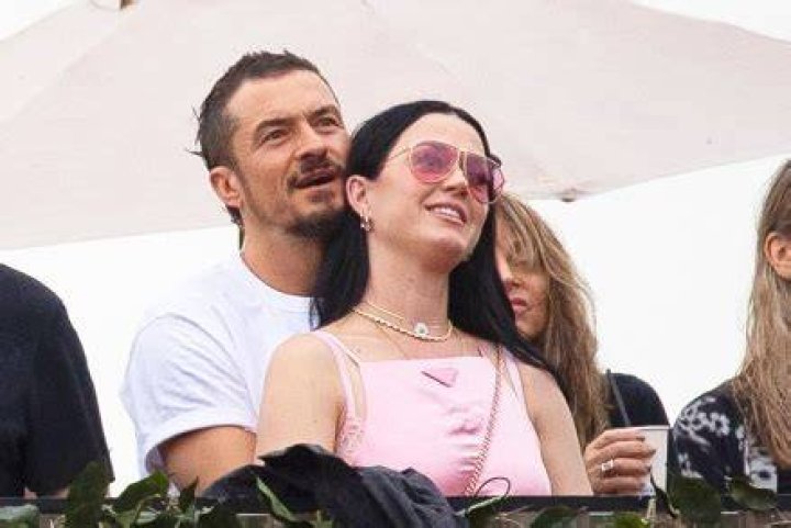Katy Perry & Orlando Bloom Caught Passionately Kissing At A Bruce Springsteen Concert: Photos