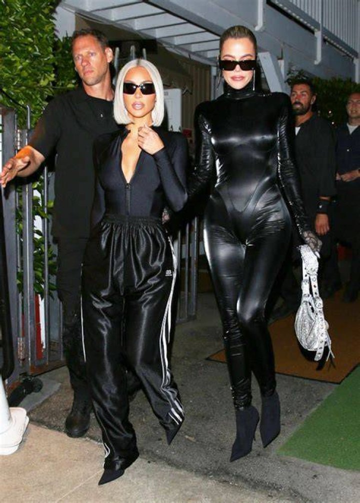 Khloe Kardashian Slays In Skintight Latex Jumpsuit After Tristan Holds Hands With Mystery Woman