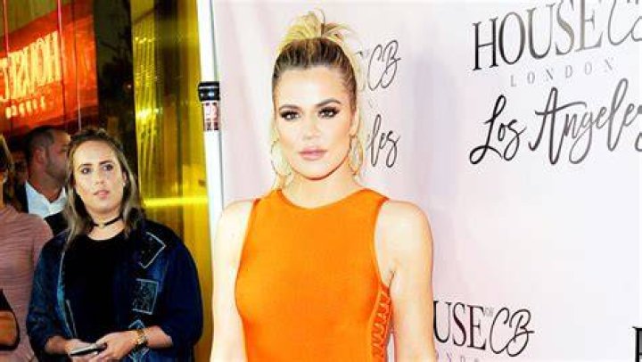 Khloe Kardashian Slays Sexy Orange Bikini In Hot New Video Amid Dating News