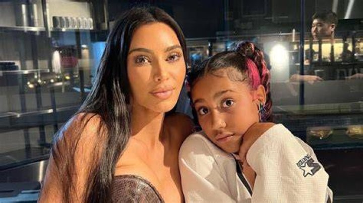 Kim Kardashian Rocks A Brown Bikini As She Snuggles With Daughter North West, 7, On A Beach