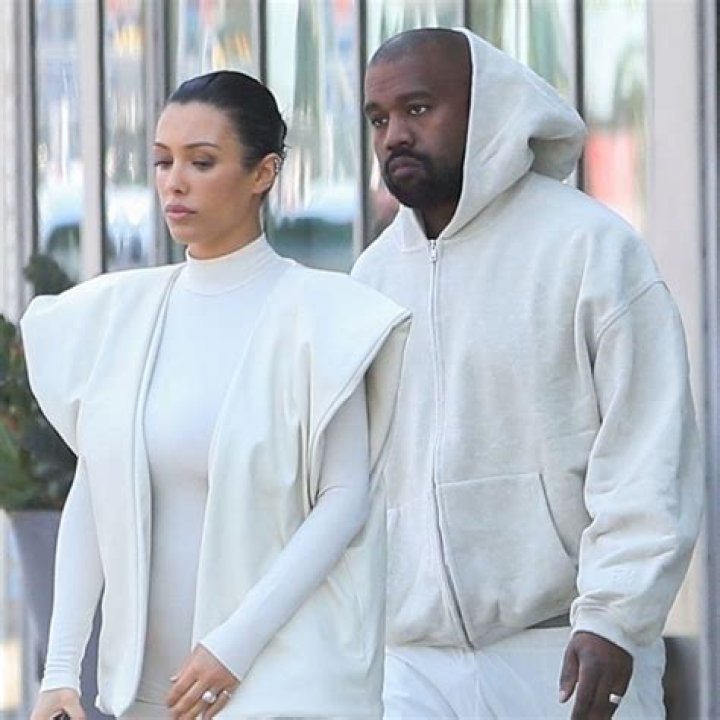 Kim Kardashian Stuns In Peekaboo Top With Low Neckline & No Wedding Ring Amid ‘Divorce’ From Kanye West