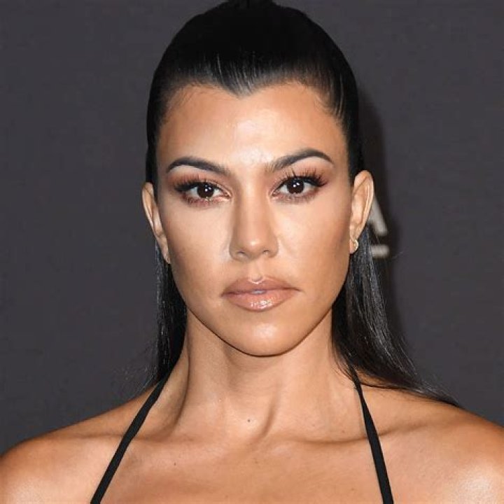 Kourtney Kardashian Devours A Burger In A Pink String Bikini While Posing Poolside — See Pic
