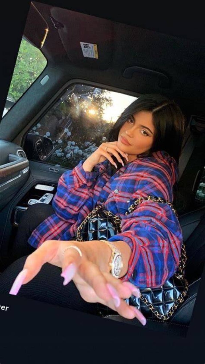 Kylie Jenner Gets ‘All Dressed Up’ In A Strapless Leather Top & Skintight Jeans — Pic