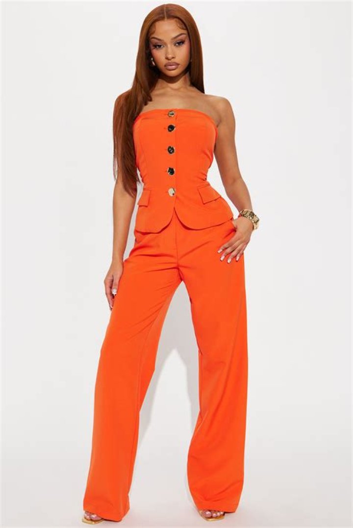 Kylie Jenner Rocked A Neon Orange Two-Piece Set & You Can Shop A Similar Outfit For $33