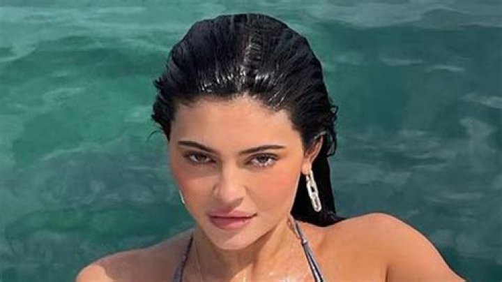 Kylie Jenner Sizzles In Tiny Yellow Bikini — Your Favorite Ever? VOTE