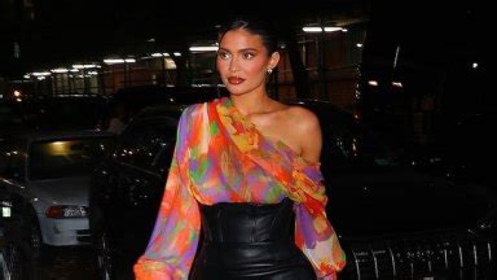 Kylie Jenner Slays In High Waisted Black Leather Mini & Off The Shoulder Blouse For Dinner in NYC – Photos
