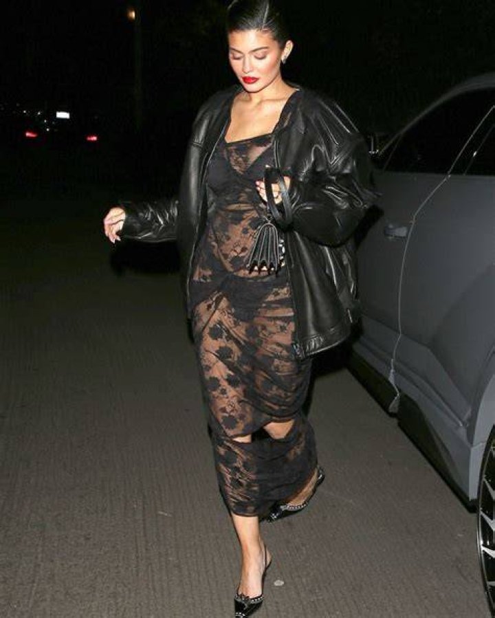 Kylie Jenner Slays In Red & Nude See-Through Dress While Out In Paris: Photos
