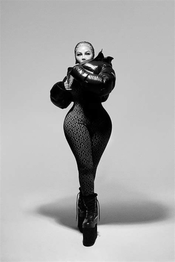 Lil’ Kim Stuns In Skintight Catsuit For Sexy New Mackage Campaign: Photos